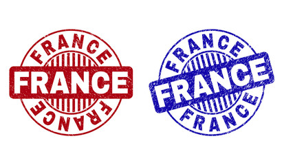 Grunge FRANCE round stamp seals isolated on a white background. Round seals with grunge texture in red and blue colors. Vector rubber overlay of FRANCE text inside circle form with stripes.