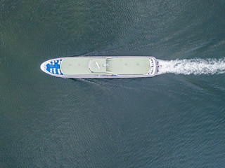 Aerial view of passenger ferry ship cruising on a lake in Switzerland.