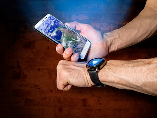 athlete syncs your smartphone and smart watch on on your hand