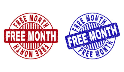 Grunge FREE MONTH round stamp seals isolated on a white background. Round seals with grunge texture in red and blue colors. Vector rubber overlay of FREE MONTH text inside circle form with stripes.