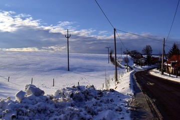 Road in idyllic winter place