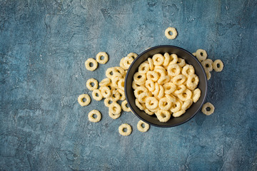 Top view on healthy and tasty ringlets dry breakfast