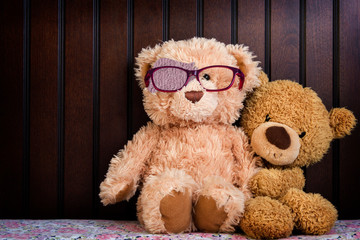 Teddy bear shows how to wear a patch to correct amblyopia; Children with lazy eye can identify with...