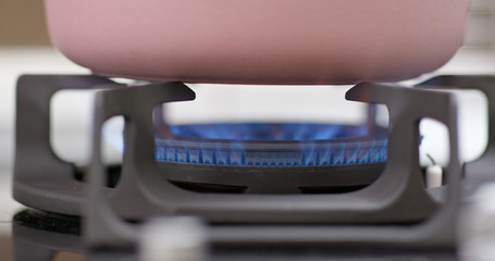Fototapeta na wymiar Natural gas inflammation in stove burner