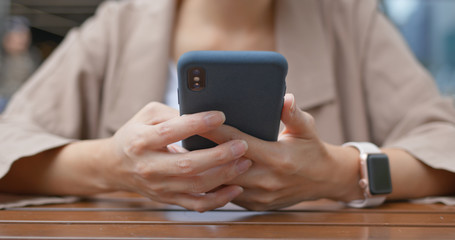 Woman use of mobile phone online