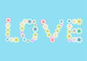 Word LOVE made of various flowers. Valentines day flat lay. Nature love concept.