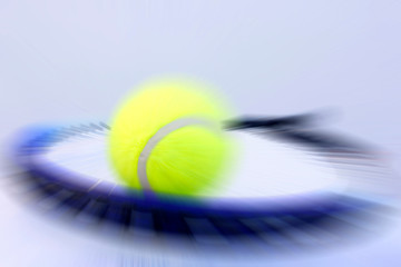 tennis ball and racket