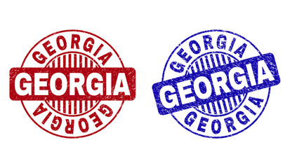 Grunge GEORGIA round stamp seals isolated on a white background. Round seals with grunge texture in red and blue colors. Vector rubber imprint of GEORGIA tag inside circle form with stripes.