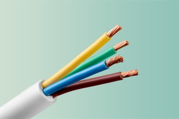 Four core armored cooper cable on  background