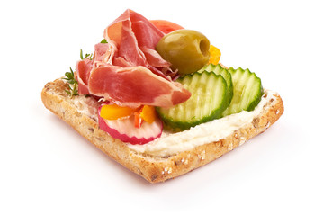 Ham, Jamon or Prosciutto open sandwich, close-up, isolated on white background