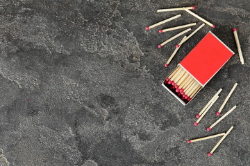 Flat lay composition with matches and space for text on grey background