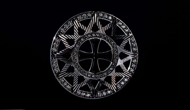 The star of Ertsgamma. Silhouette on a black background. Ancient Christian symbol.