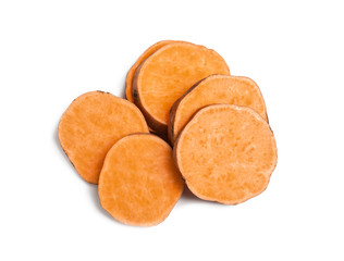 Slices of ripe sweet potato on white background, top view