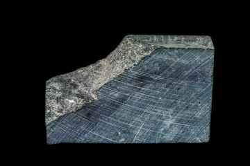 Macro stone Nephrite mineral on black background
