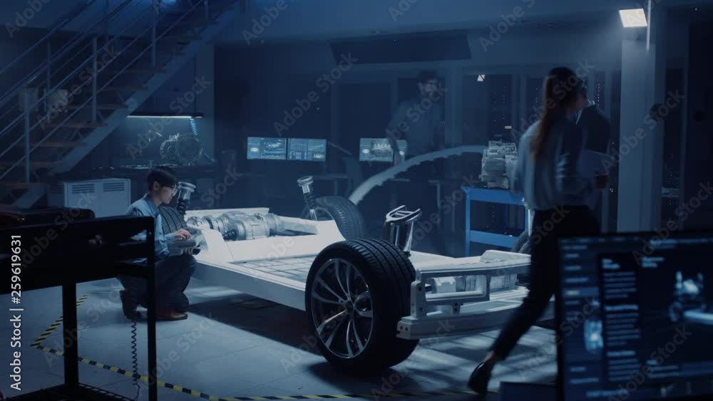Poster automotive design engineers work and do tests on electric car chassis prototype. in innovation labor