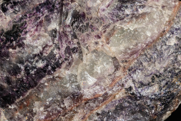 Macro stone mineral Fluorite on a black background
