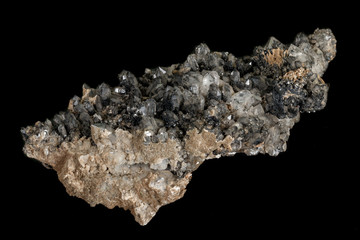 Macro stone mineral Quartz with ilvayit on a black background