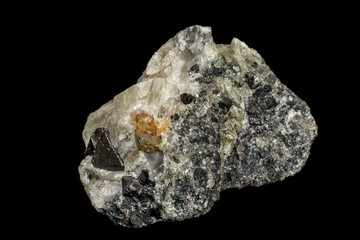 Macro stone Apatite and magnetite mineral on parade on black background