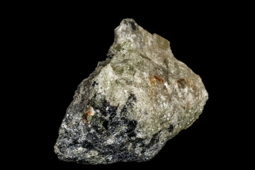Macro stone Apatite and magnetite mineral on parade on black background