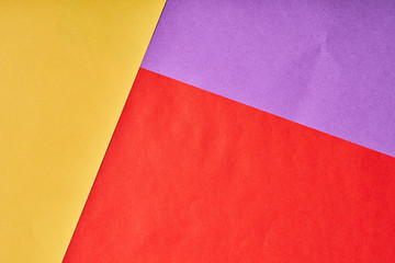 Multi-colored background of several sheets of paper