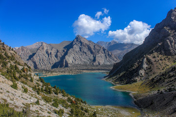 Fototapeta na wymiar The blue lake of the fan mountains of Tajikistan