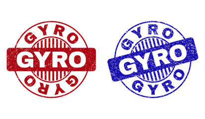 Grunge GYRO round stamp seals isolated on a white background. Round seals with grunge texture in red and blue colors. Vector rubber overlay of GYRO caption inside circle form with stripes.