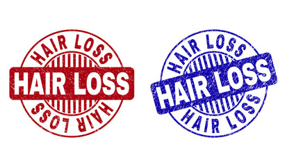 Grunge HAIR LOSS round stamp seals isolated on a white background. Round seals with grunge texture in red and blue colors. Vector rubber imprint of HAIR LOSS label inside circle form with stripes.