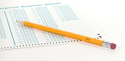 Standardized test form with pencil and eraser with a shallow depth of field and copy space