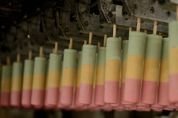 The conveyor automatic lines for the production of ice cream. Production of ice-cream at milk factory
