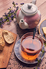 Nice cuo of tea and cheese with bread