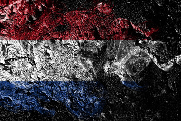 Netherlands smoky mystical flag on the old dirty wall background