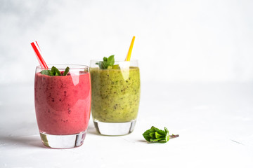 Fruit and berry smoothie blend at home on a light background copy space.