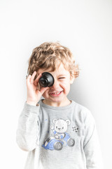 Fototapeta premium Child playing with coffee capsules