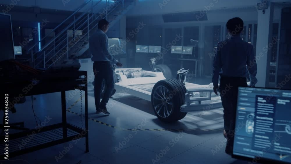 Poster diverse team of automobile design engineers enter automotive innovation facility start working on el