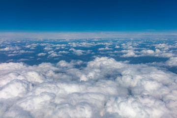 Fototapeta na wymiar View from airplane window to the sky.