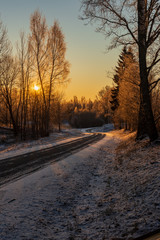 snowy winter road covered in ice and snow