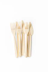 Plastic utilization and the Earth protection concept with flatware on white background top view mock up
