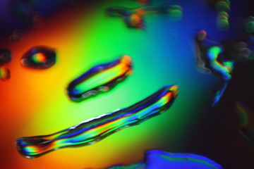 abstract colorful background with water splash on holographic background