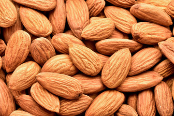 Almonds close-up as background, macro