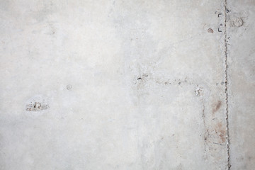 Formwork traces on concrete. Repair and construction or constructing. Concrete background. Grey color. Cement texture. Poor quality curve wall. Flaws, defects and cracks in the wall. .