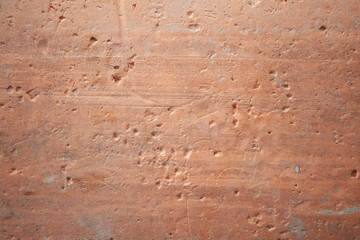 Formwork traces on concrete. Repair and construction or constructing. Concrete background. Grey color. Cement texture. Poor quality curve wall. Flaws, defects and cracks in the wall. .