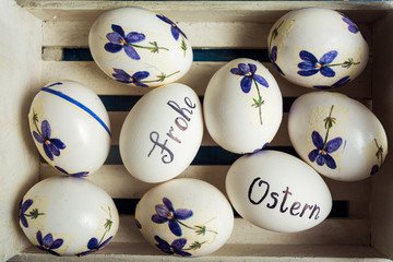 Frohe Ostern written on eggs