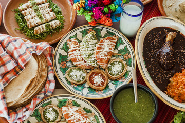 sopes, tacos dorados and flautas de pollo, Mexican food, spicy sauce in Mexico