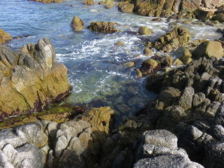 Naklejka na ściany i meble rocks on beach