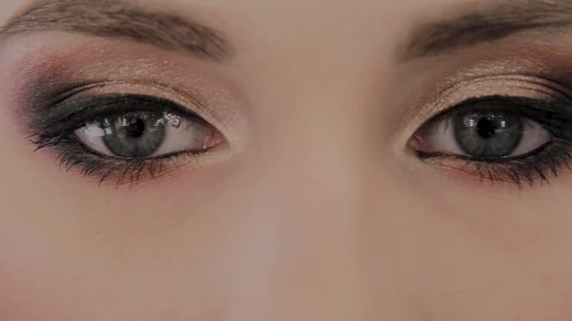 Beautiful eyes of a model photo close up.