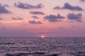 Pink and purple sunset over the ocean