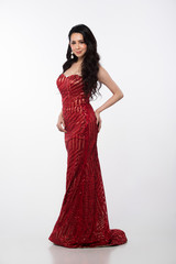 Portrait of Miss Asian Woman Pageant Beauty Contest in sequin Evening Ball Gown long dress, full length, stand snap sexy glamour elegance look, studio lighting white background copy space