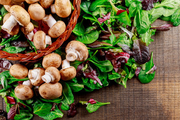 Healthy salad with Raw Champignons with vegan salad with raw mushrooms.