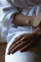 close up of a brides hands on her wedding day