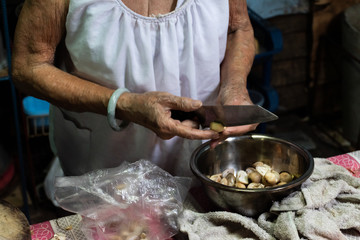 grandmother is cooking dinner